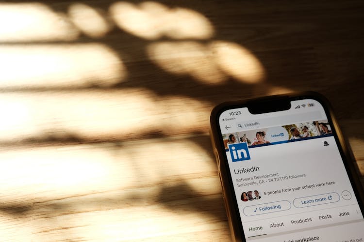 Close-up Of Linkedin Page On Smartphone Screen