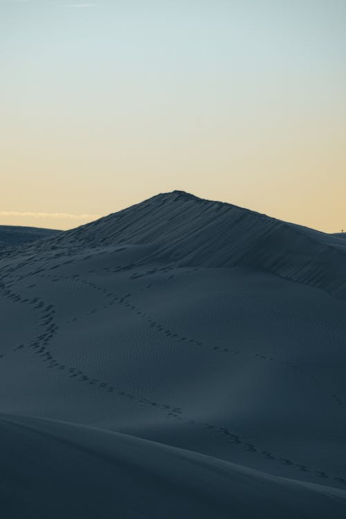 Brown Sand Dunes during Sunset · Free Stock Photo