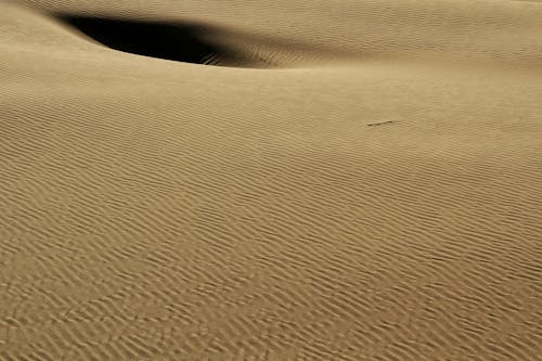 Foto stok gratis bayangan, bukit pasir, fotografi udara