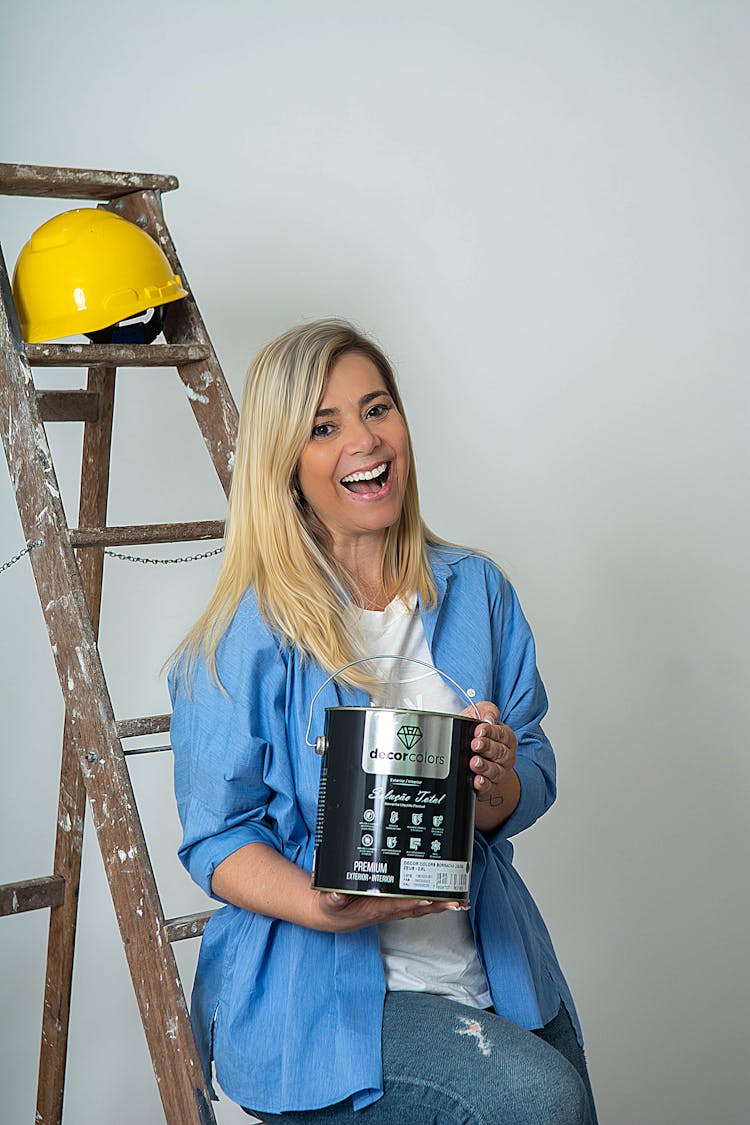 Blonde Woman Posing With Paint Bucket