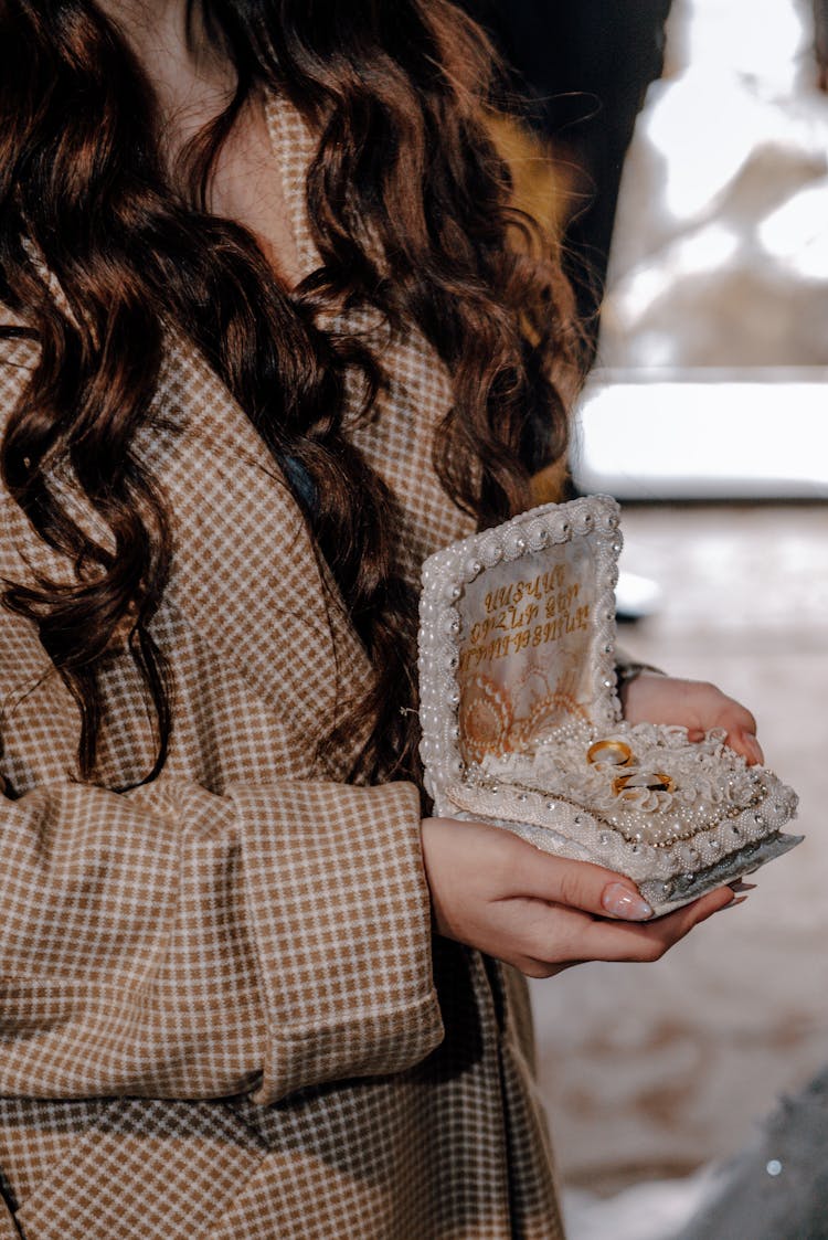 Box Of Jewelry In Woman Hands