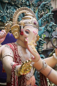 Detailed image of a vibrant Ganesh idol decorated for Ganesh Chaturthi in Mumbai, India.