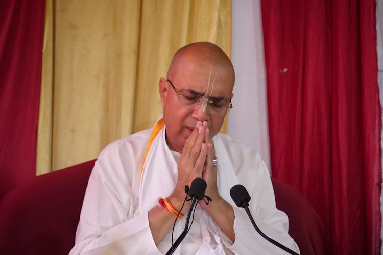 Dr Vrindavan Chandra Das Praying With Hands Clasped And Eyes Closed