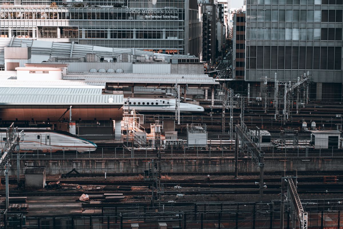 Tokyo train station platform with commuters