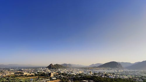 Kostnadsfri bild av berg, blå himmel, brunt berg