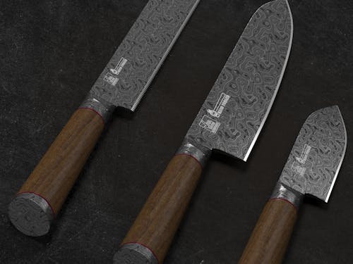 Close-up of a Collection of Sharp, Handmade Knives