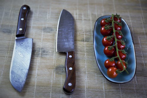 Sharp Knives and a Sprig of Tomatoes 