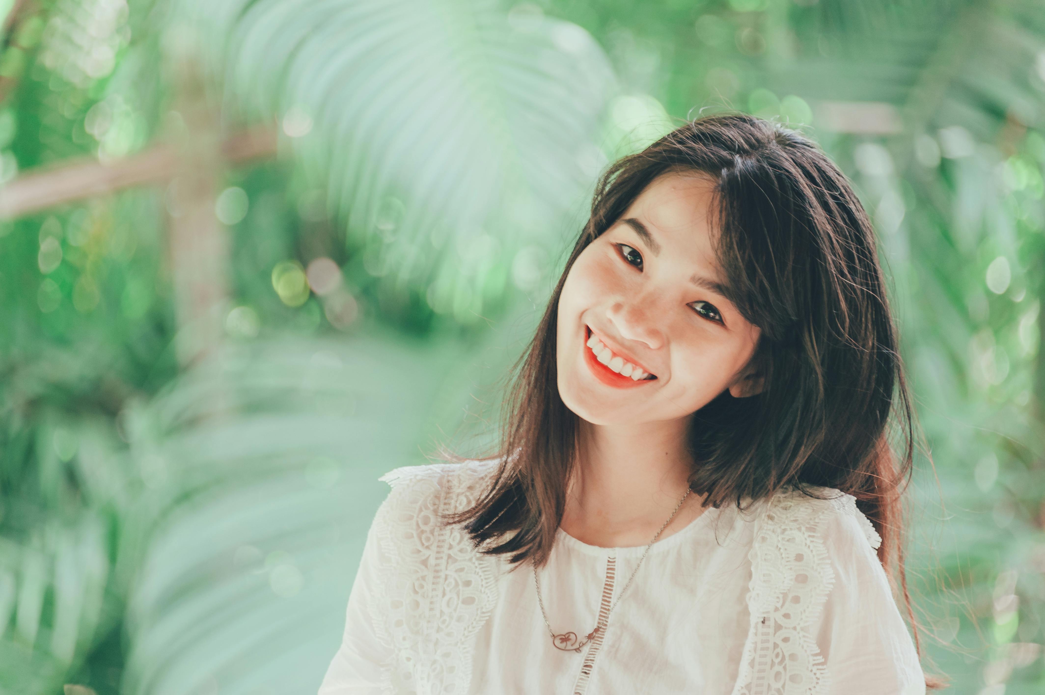 close up photo of woman smiling