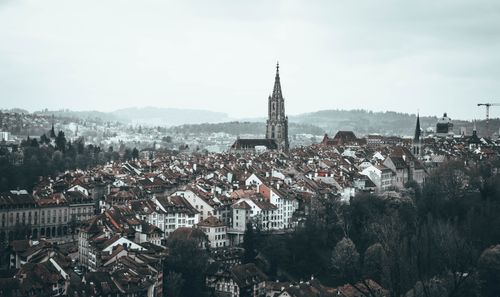 Free Tranquil aerial view of Bern, Switzerland, featuring the iconic Bern Cathedral and historic architecture. Stock Photo