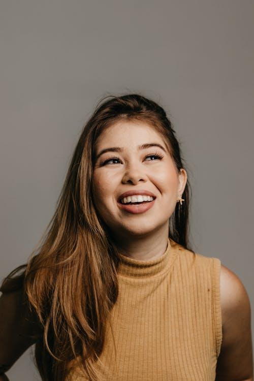 Portrait of Brunette Woman in a Studio 