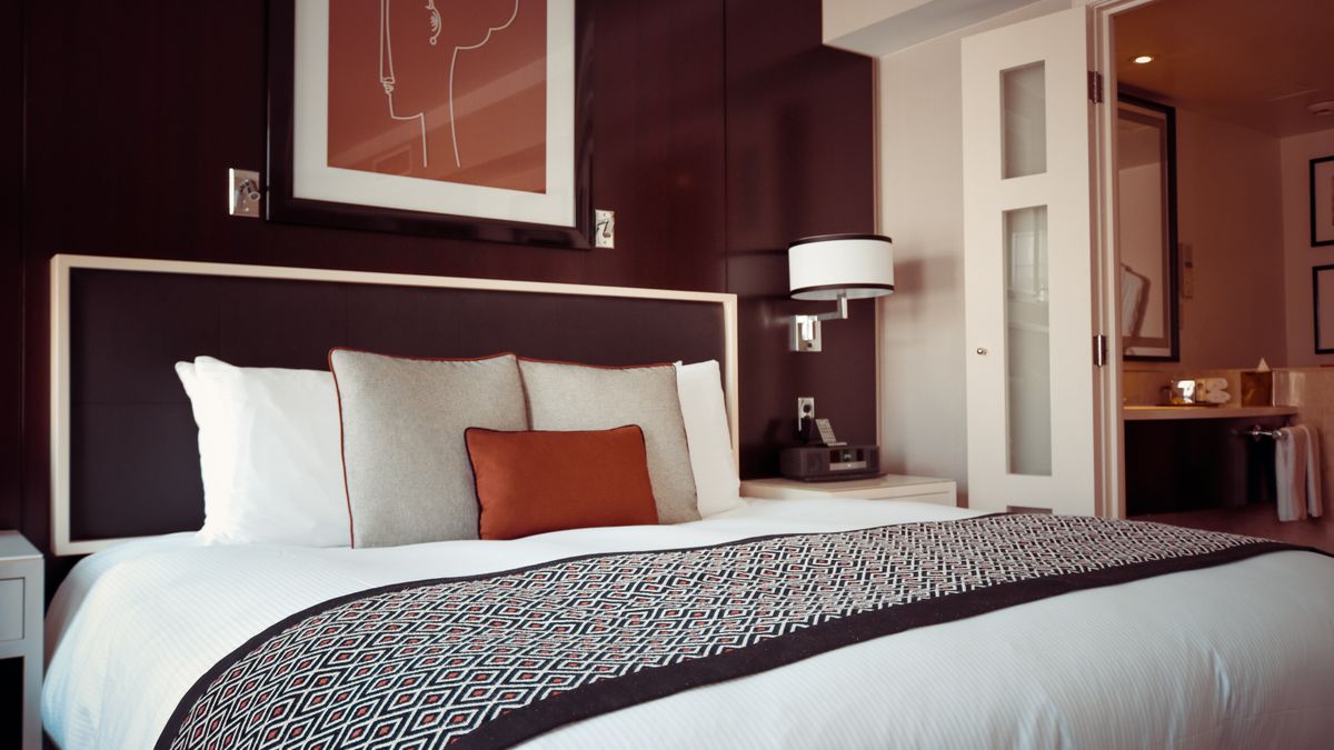 A bright, comfortable hotel room during the day, the kind of room booked as a day-use stay