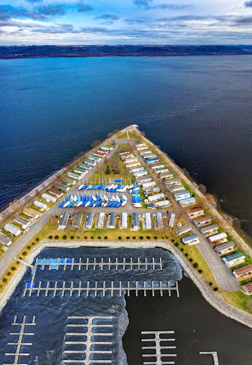 Bird's-view Photo of Houses Near Body of Water