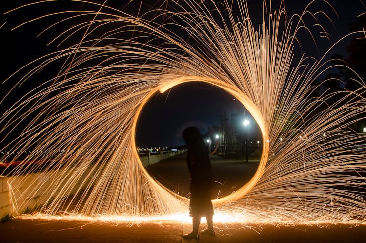 Sparkling Circle On Pavement At Night