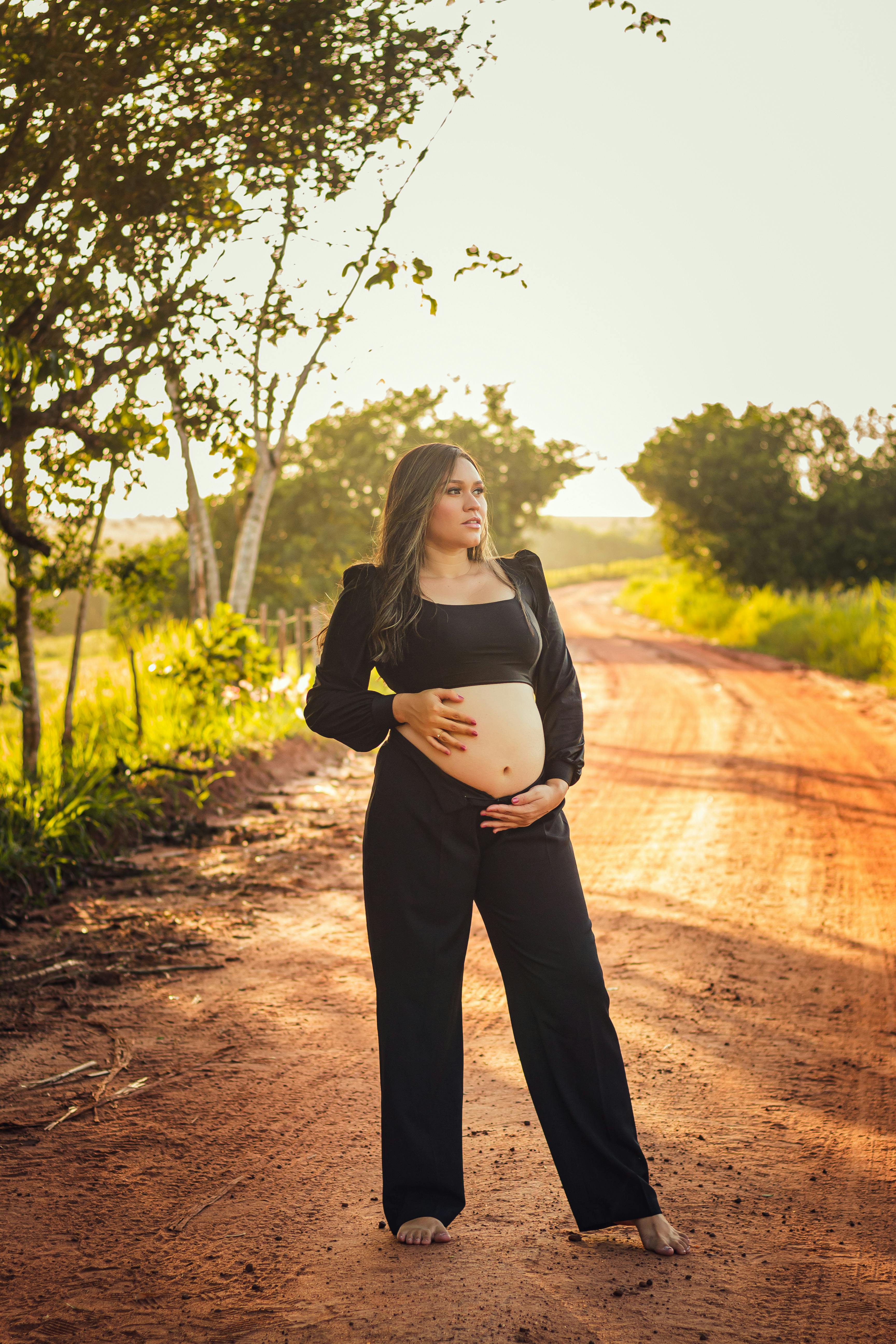 Pregnant Woman Poses For Photo Shoot In Studio Stock Photo by  ©svyatoslavlipik 336016028