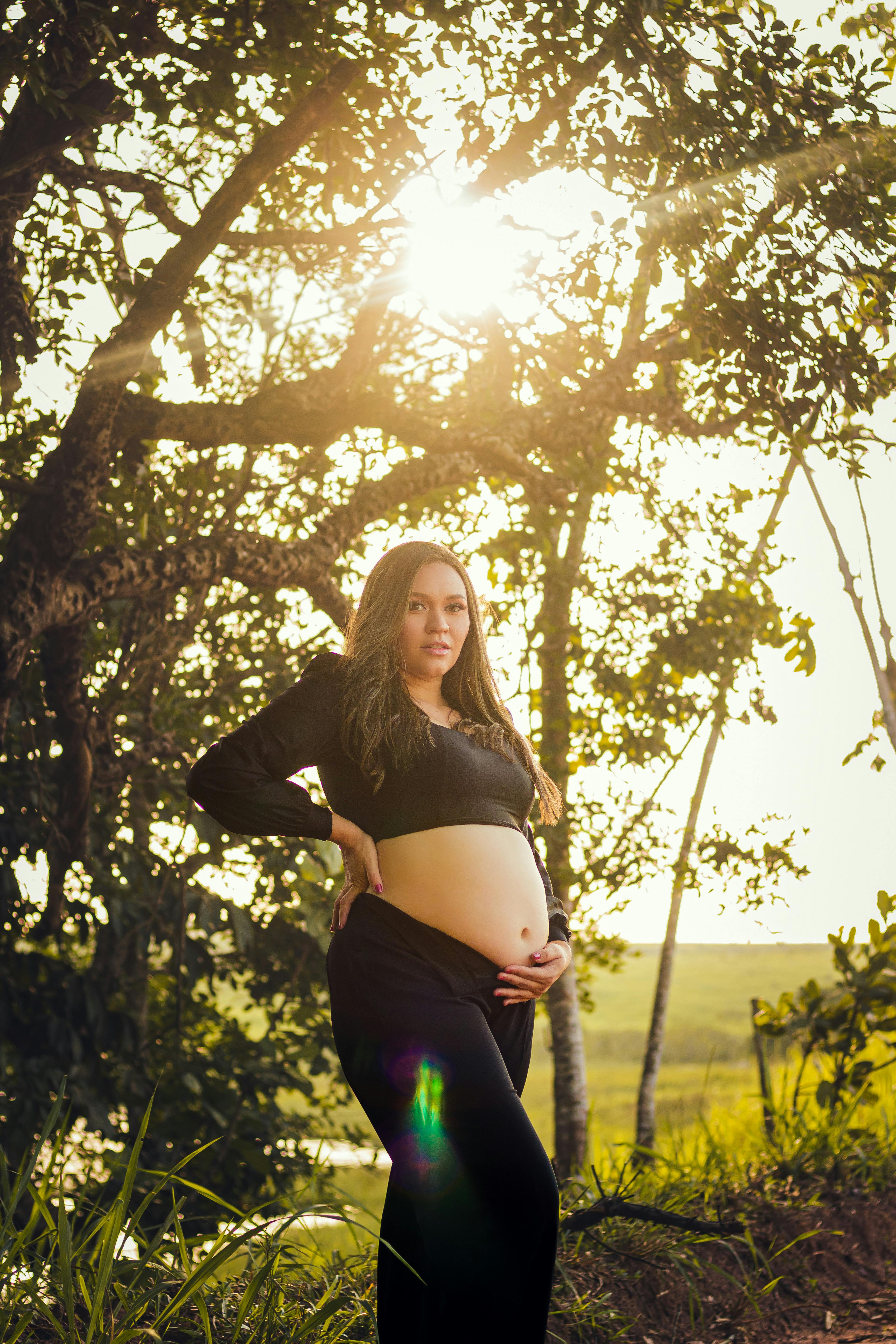 Plus Size Pregnancy Stock Photo: Pregnant Woman Standing in Forest - It's  time you were seen ⟡ Body Liberation Photos