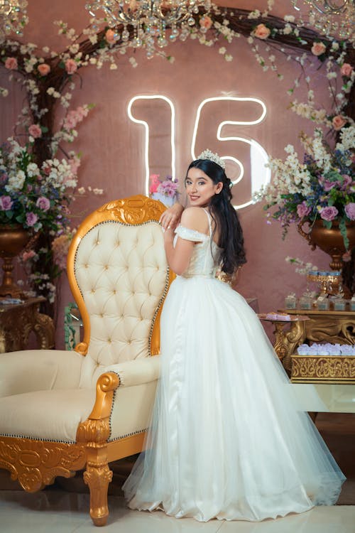 Free A Teenage Girl Posing at her Birthday Party  Stock Photo