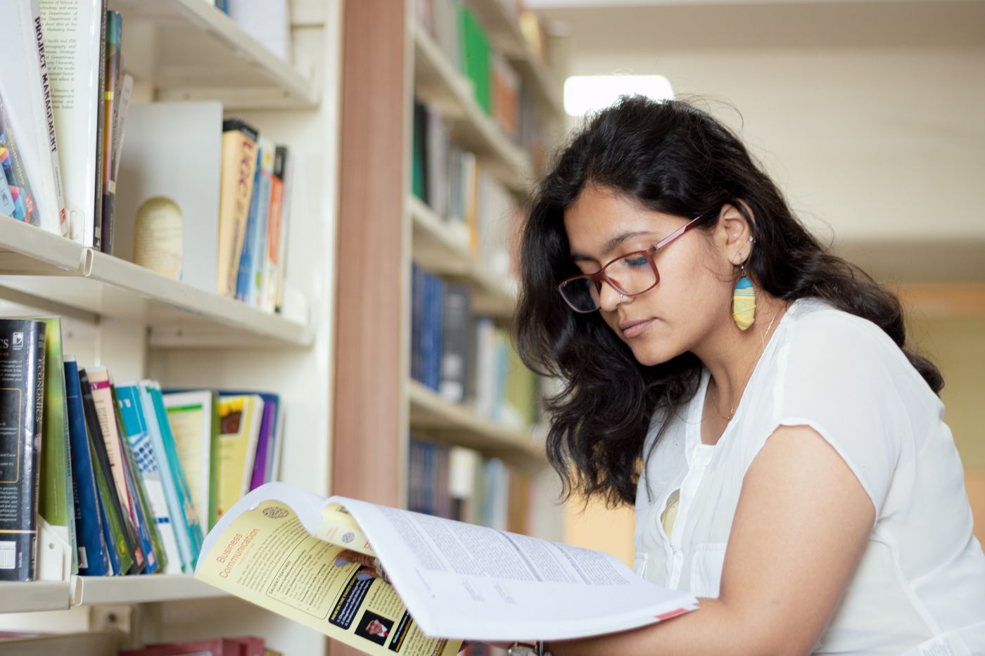 A cadet reading in the Sainik School Tuticorin library