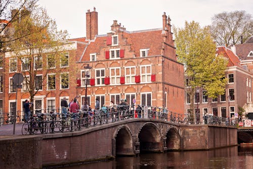 amsterdam, bina cephesi, bisikletler içeren Ücretsiz stok fotoğraf