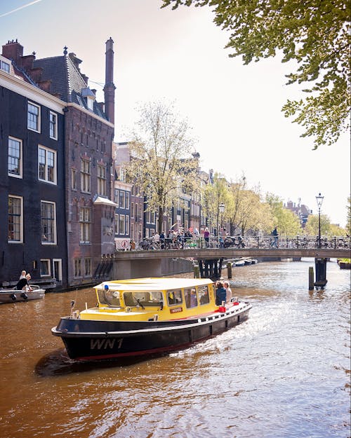 Tourist Boat on Amsterdam Canal
