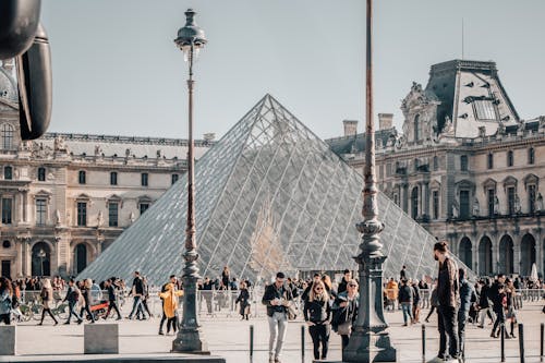 A Crowded Square at the Louvre in Paris, France