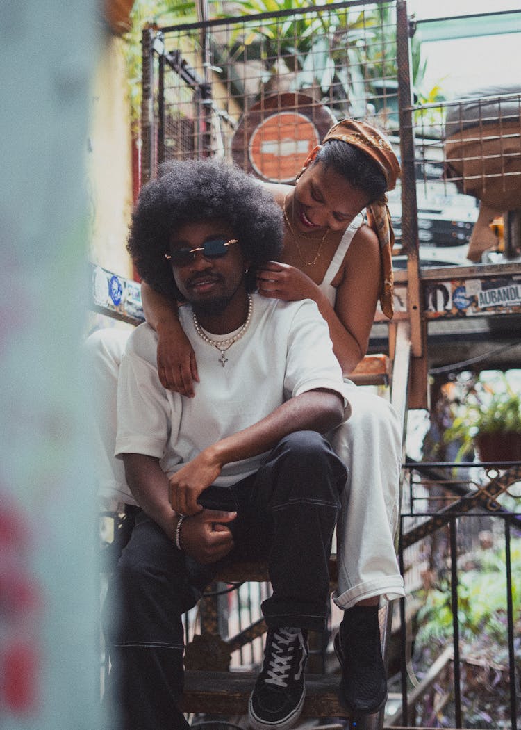 Couple Hugging On A Street