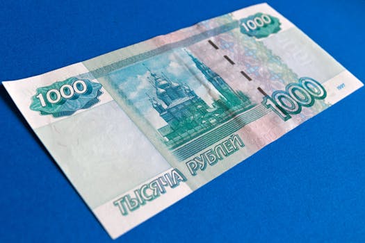 1000 Banknote on Top of Blue Surface