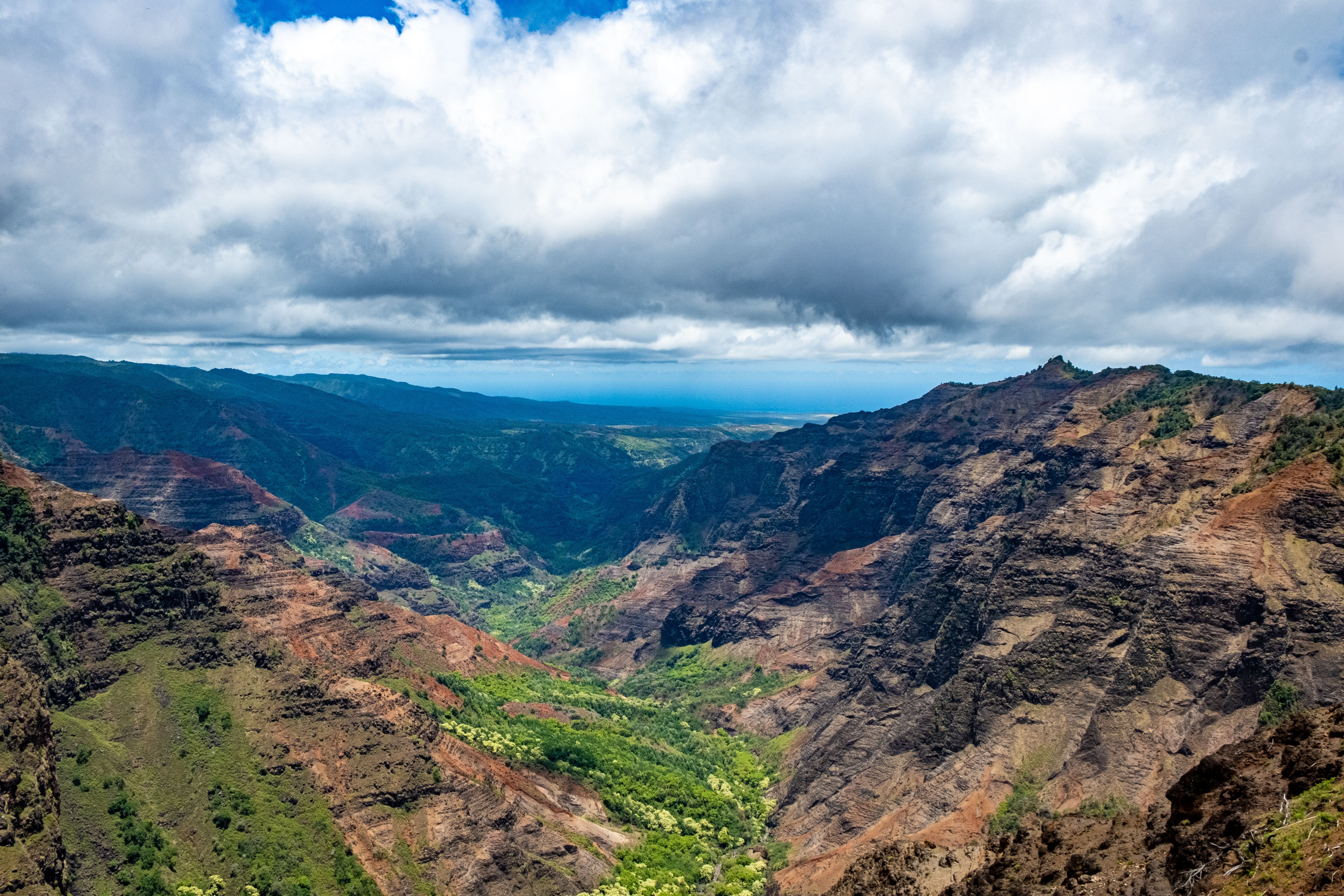 The red rock and green ridges of Waimea Canyon on Kauai, Hawaii