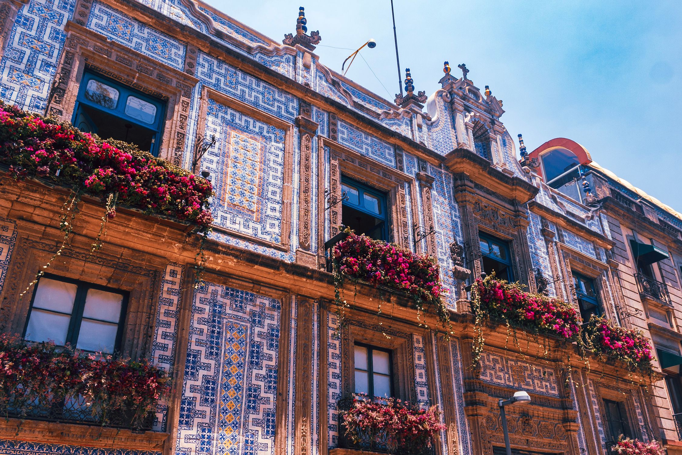 Vibrant Casa de los Azulejos facade in Mexico City showcasing baroque architecture.