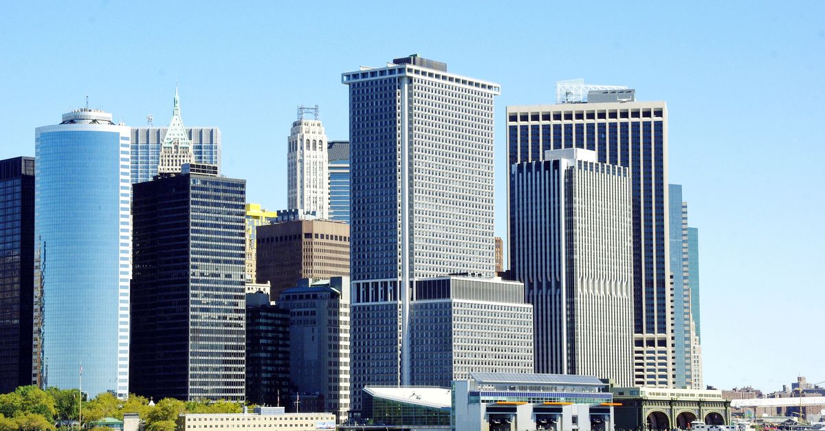 View of New York City's iconic waterfront skyline with modern skyscrapers.