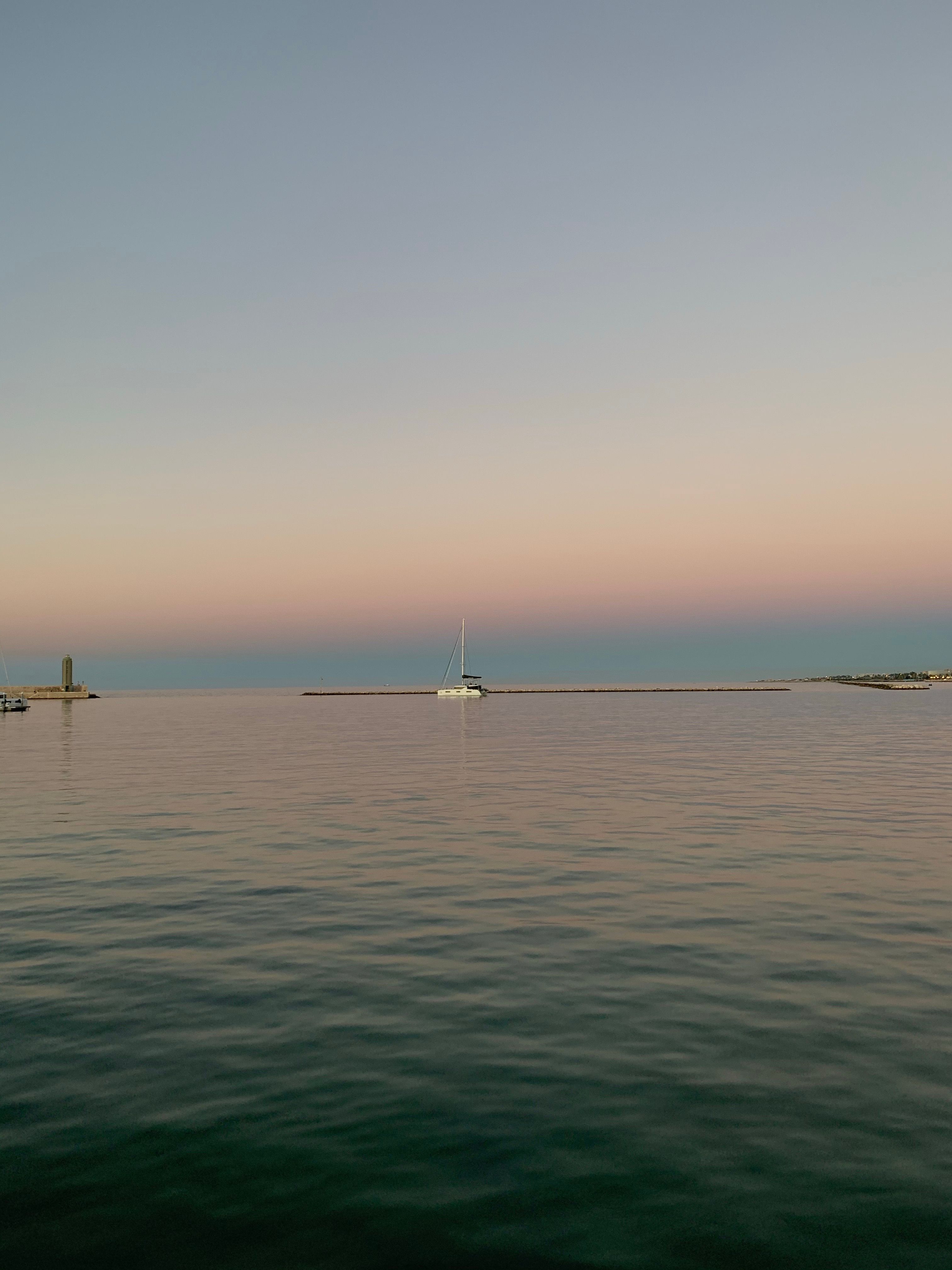 Clear Sky over Sea on Coast at Sunset · Free Stock Photo