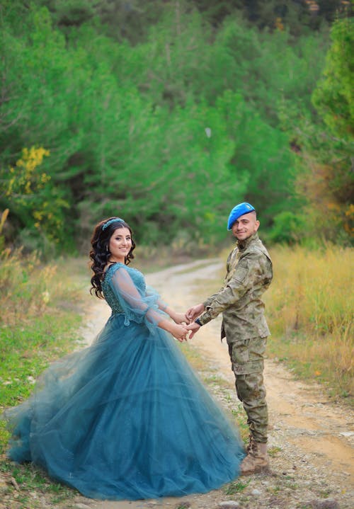 Soldier and Woman in Blue Dress