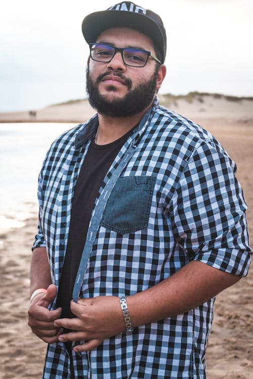 Man Wearing Gingham Shirt And Black Framed Eyeglasses