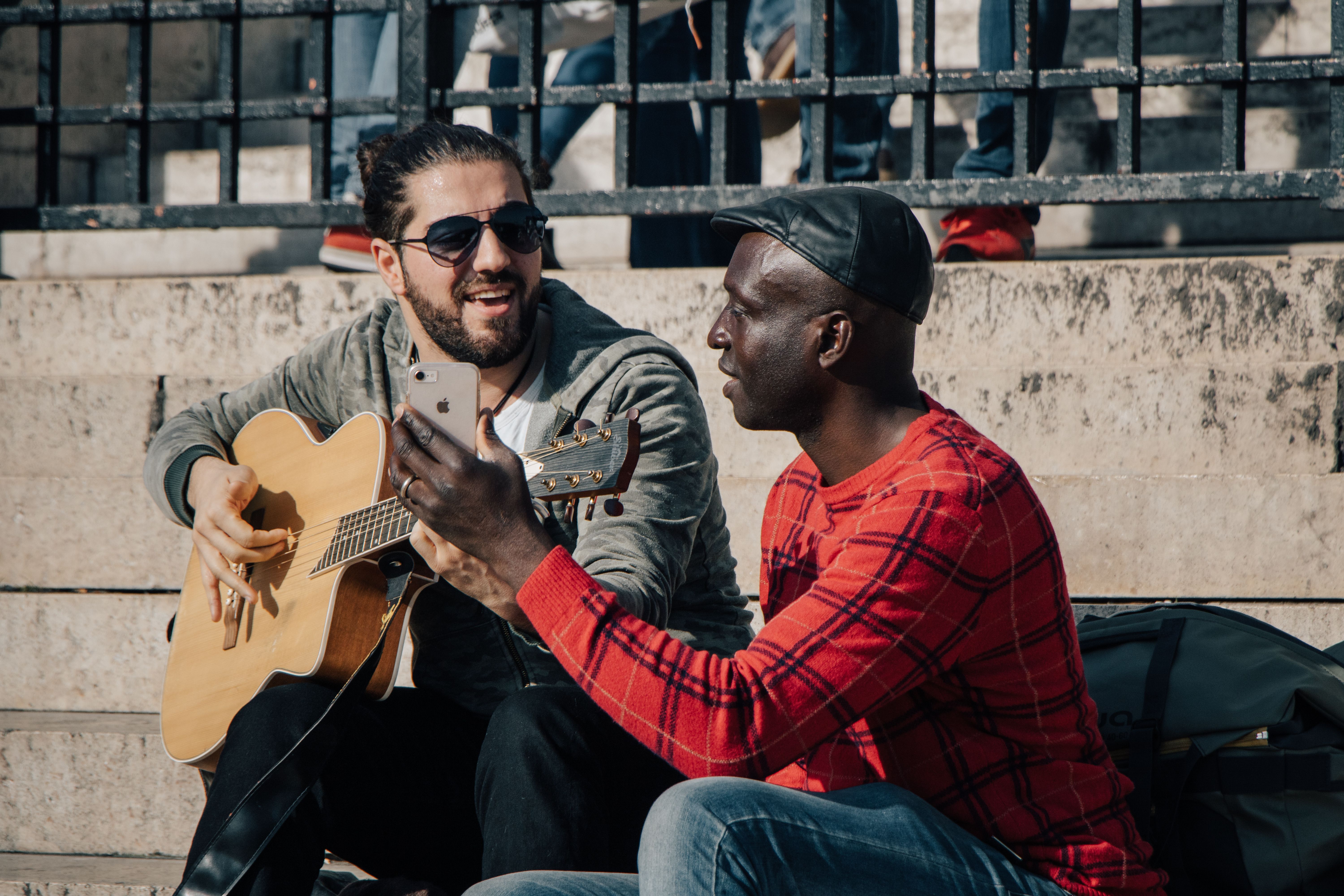 Men Playing on Guitar on a Street · Free Stock Photo