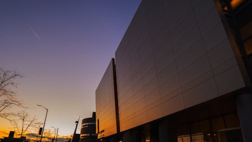 Grey and Black Concrete Building during Golden Hour