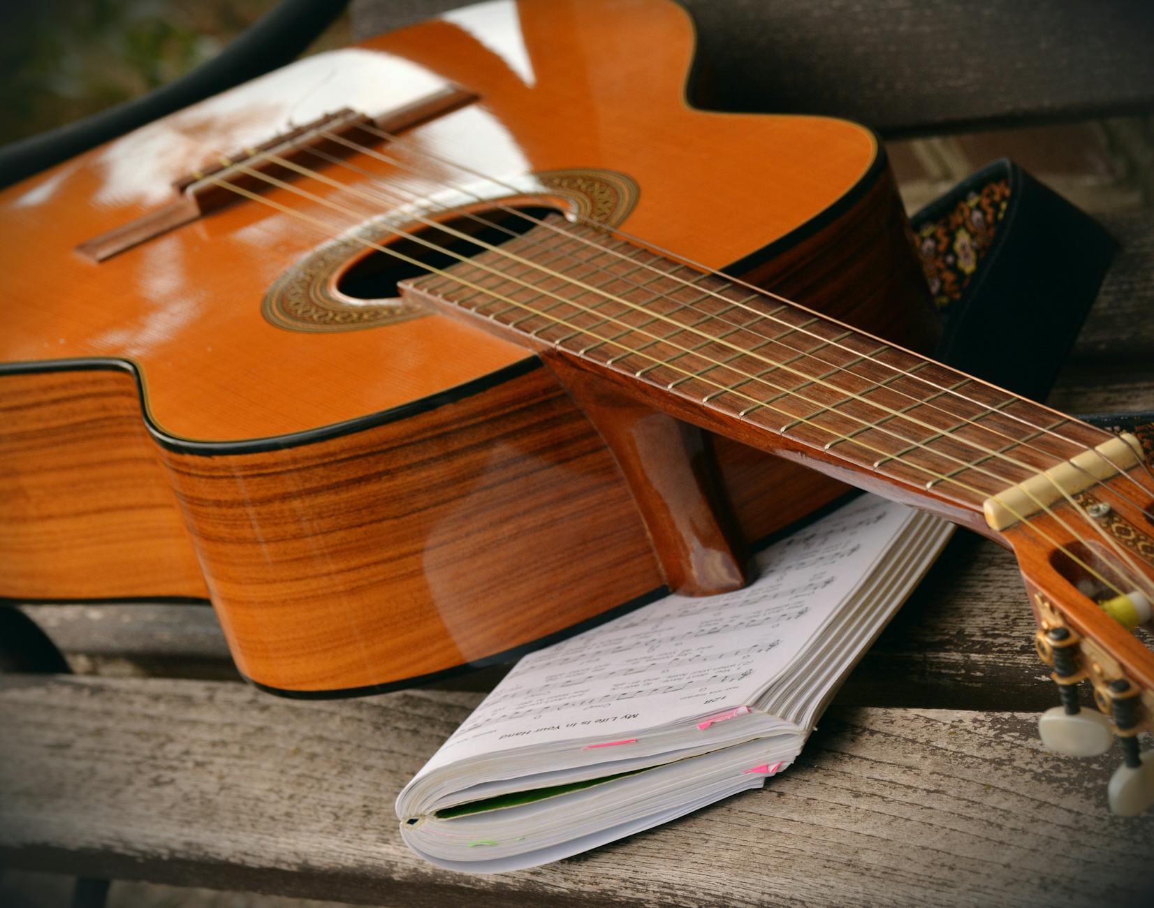 Guitar with song book