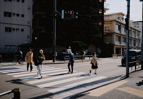 Pedestrians Crossing the Street in Japan