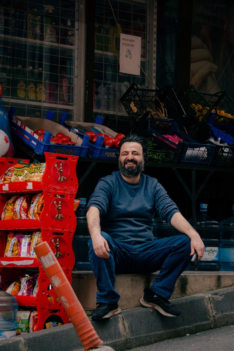 Smiling Seller At Bazaar