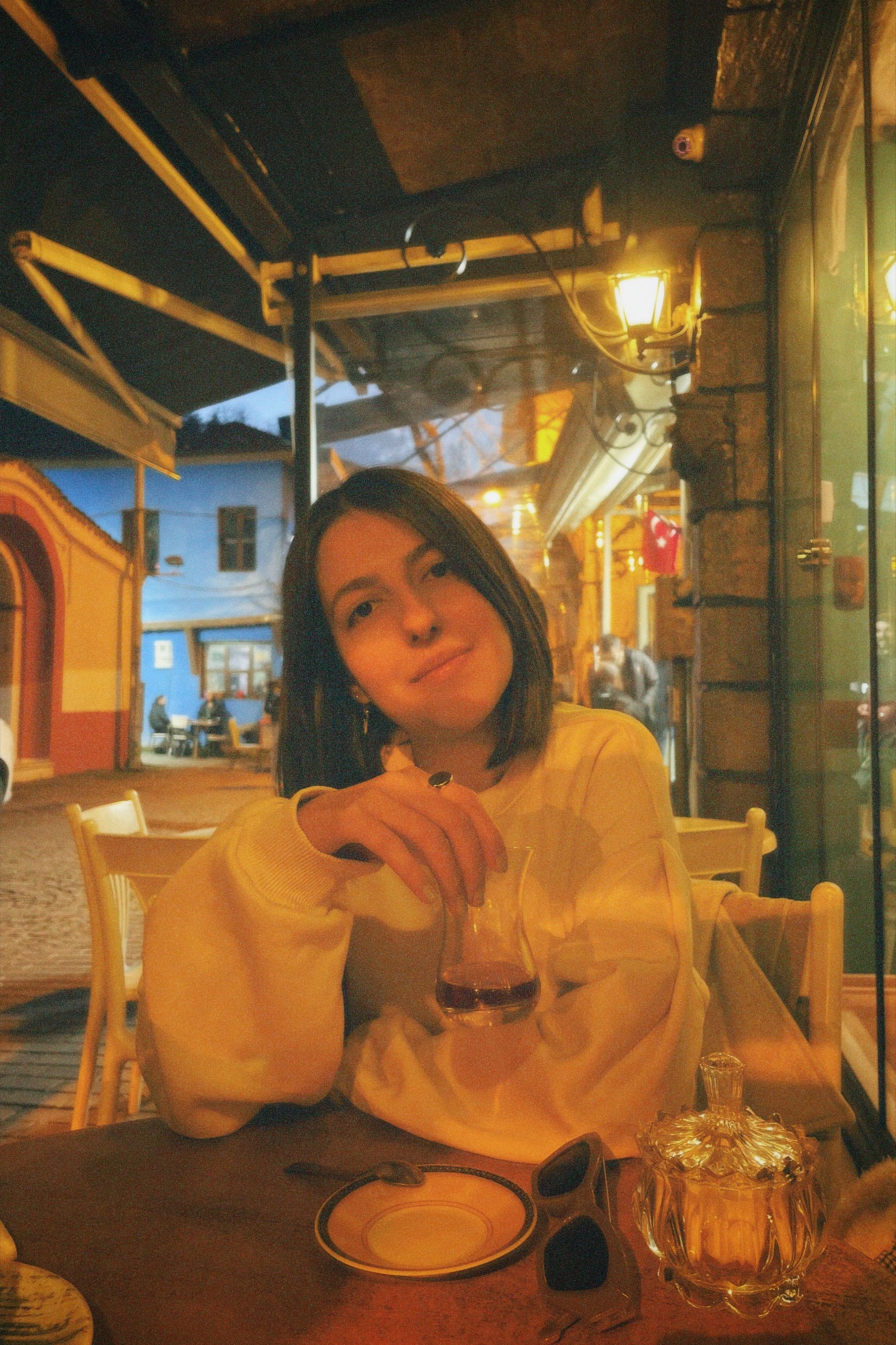 Woman Posing by Table · Free Stock Photo