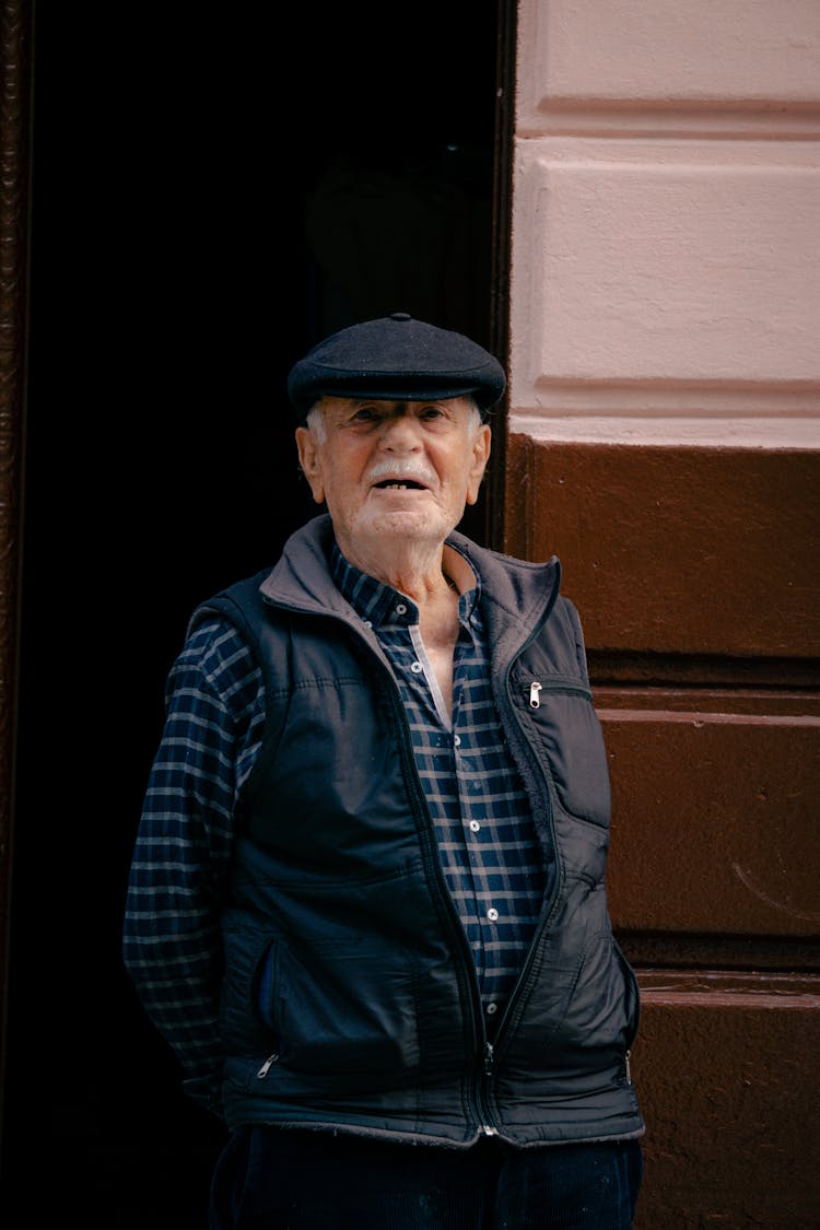 Elderly Man In Vest