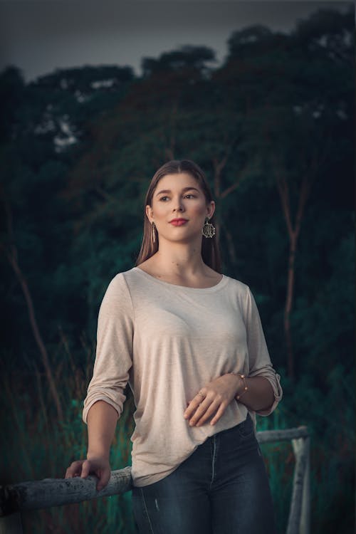 Woman Posing with Trees behind