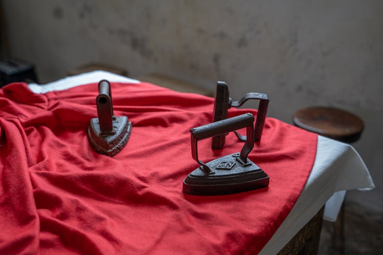 Vintage Irons On Table