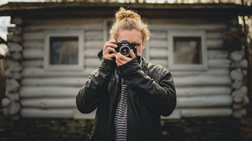 Person Holding Camera