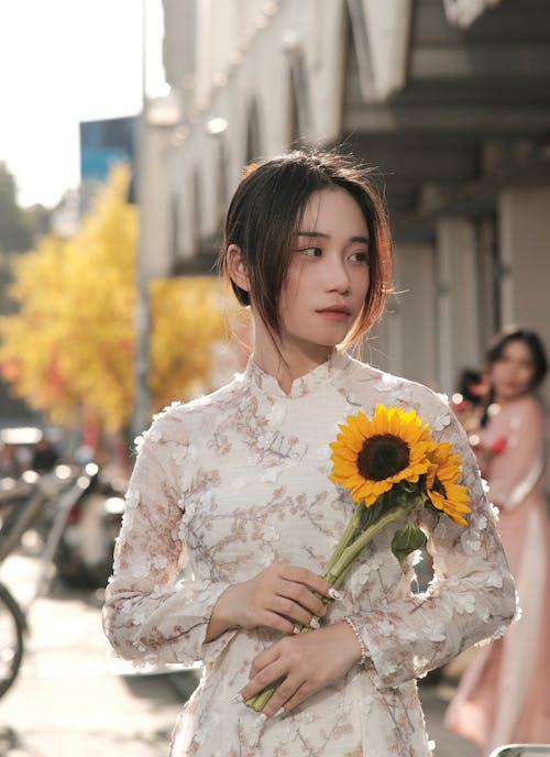 Portrait of Woman with Sunflowers