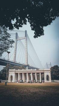 A stunning view of Vidyasagar Setu in Kolkata, capturing the blend of historic and modern architecture.