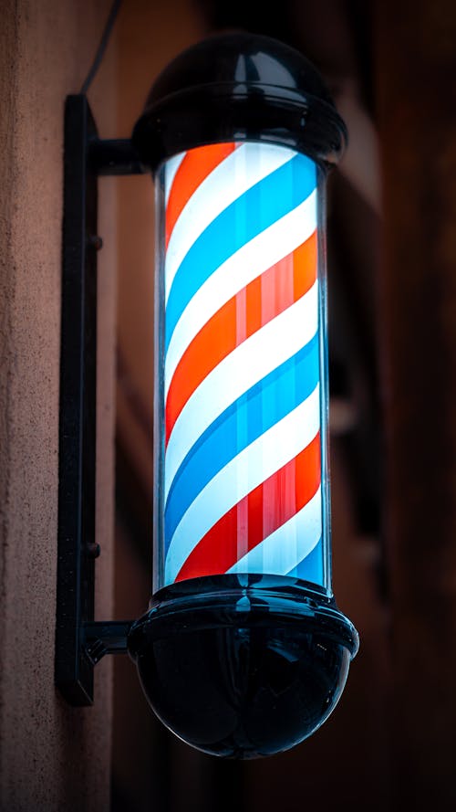 Close-up of a Light Outside of a Barber Shop 
