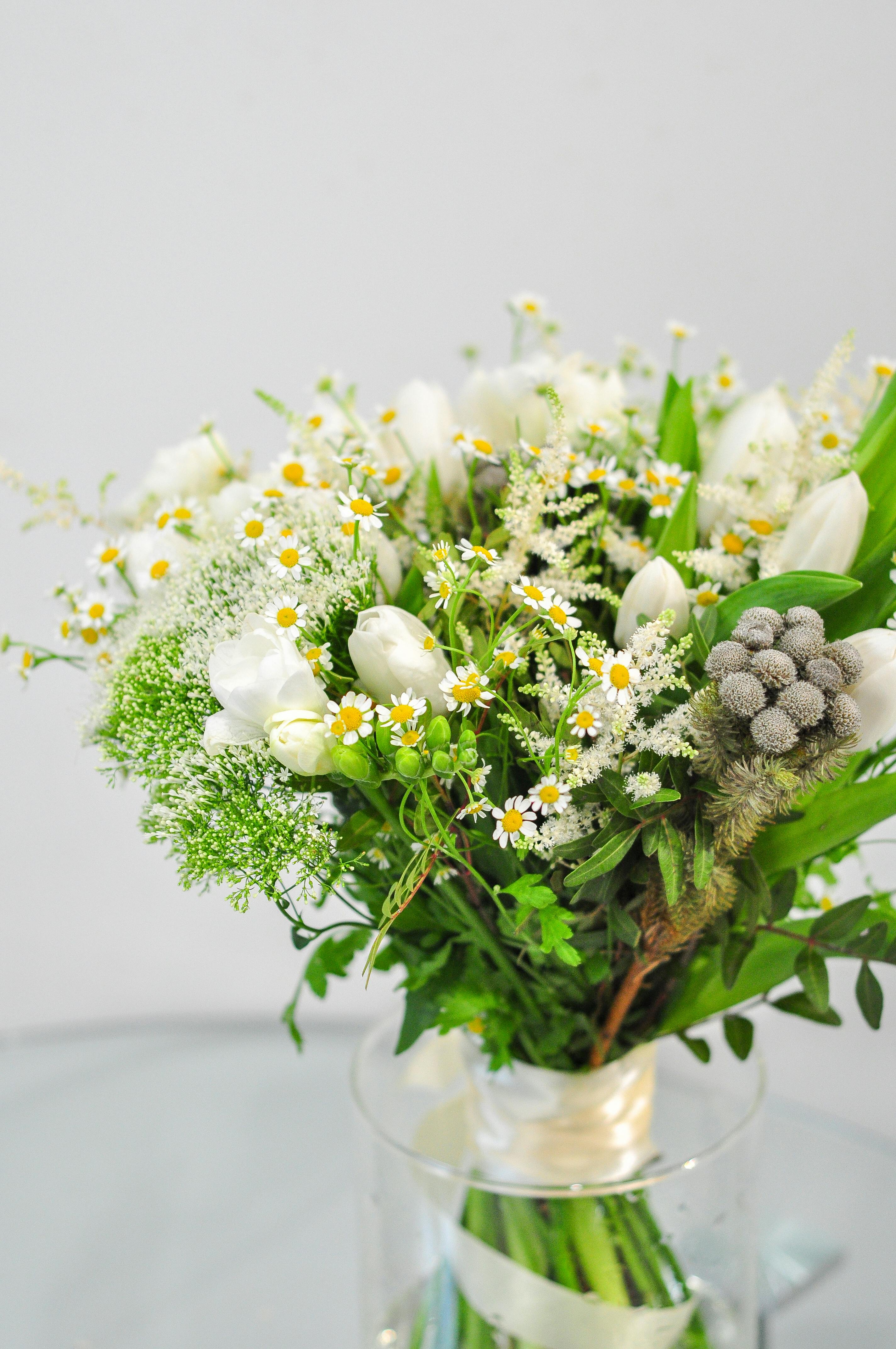 Person Holding a Flower Bouquet · Free Stock Photo