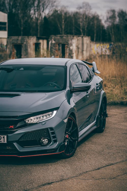 Sports Honda Civic Type R Parked in front of Abandoned Buildings