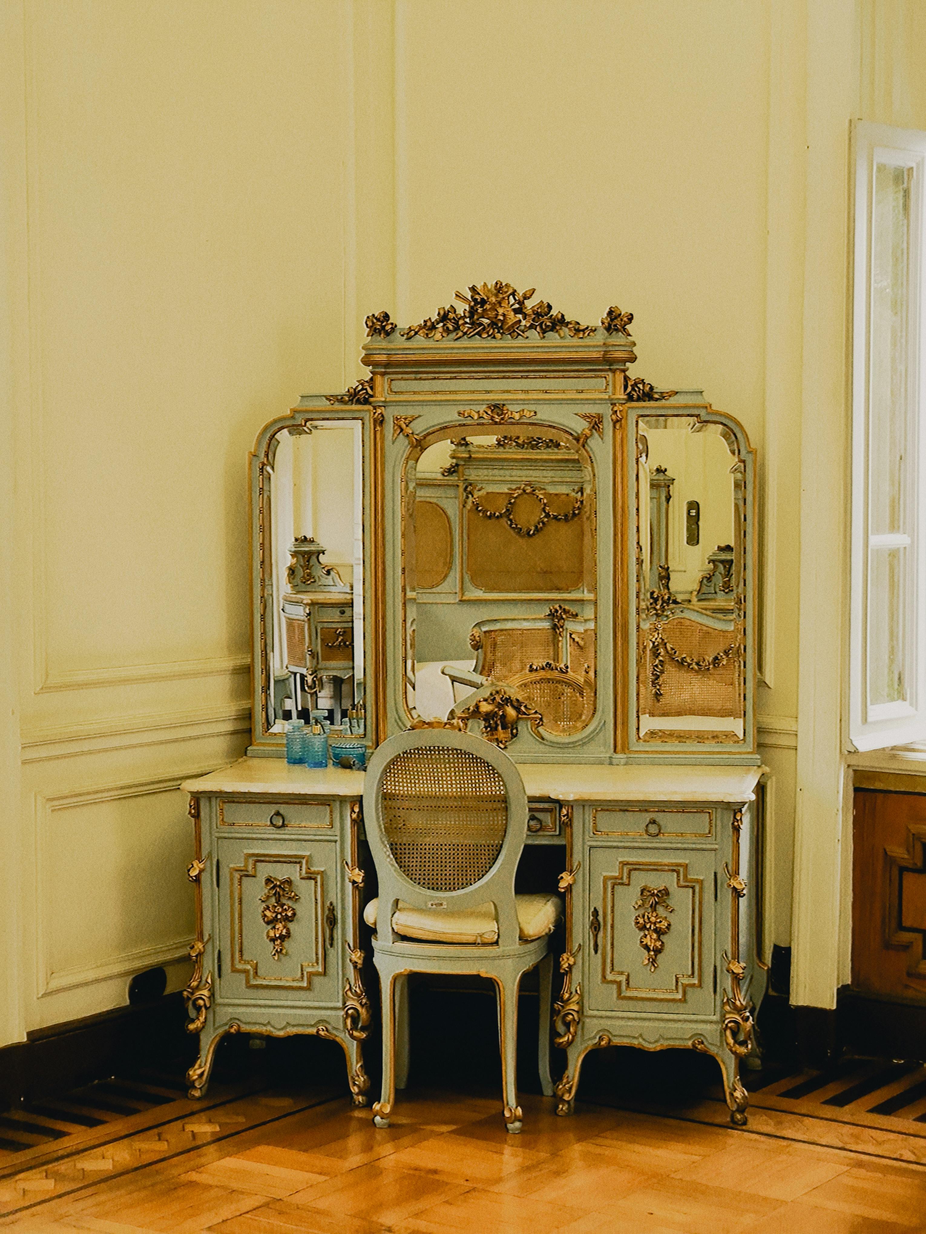 Ornate vintage dressing table with mirror, capturing luxury and classic design.