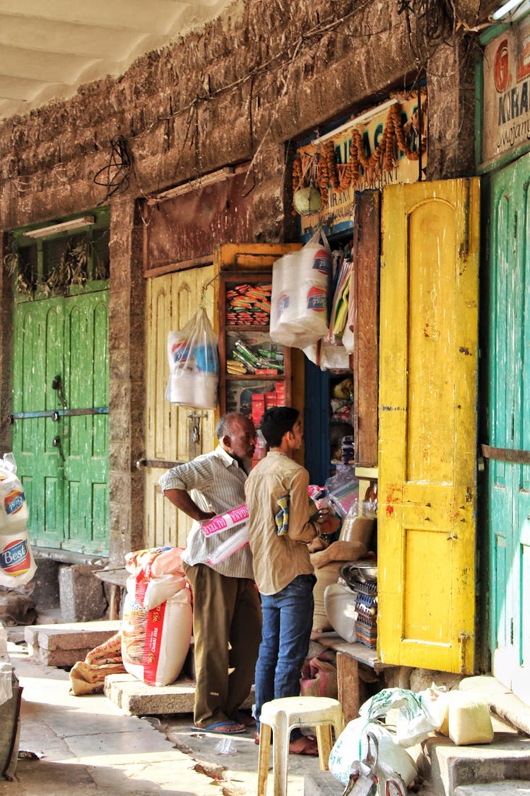 Men At The Local Market 