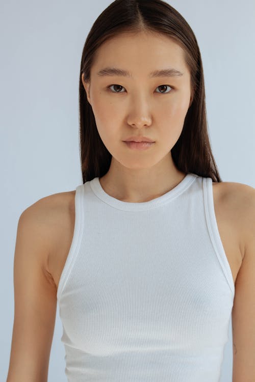 Portrait of Woman in White Tank Top